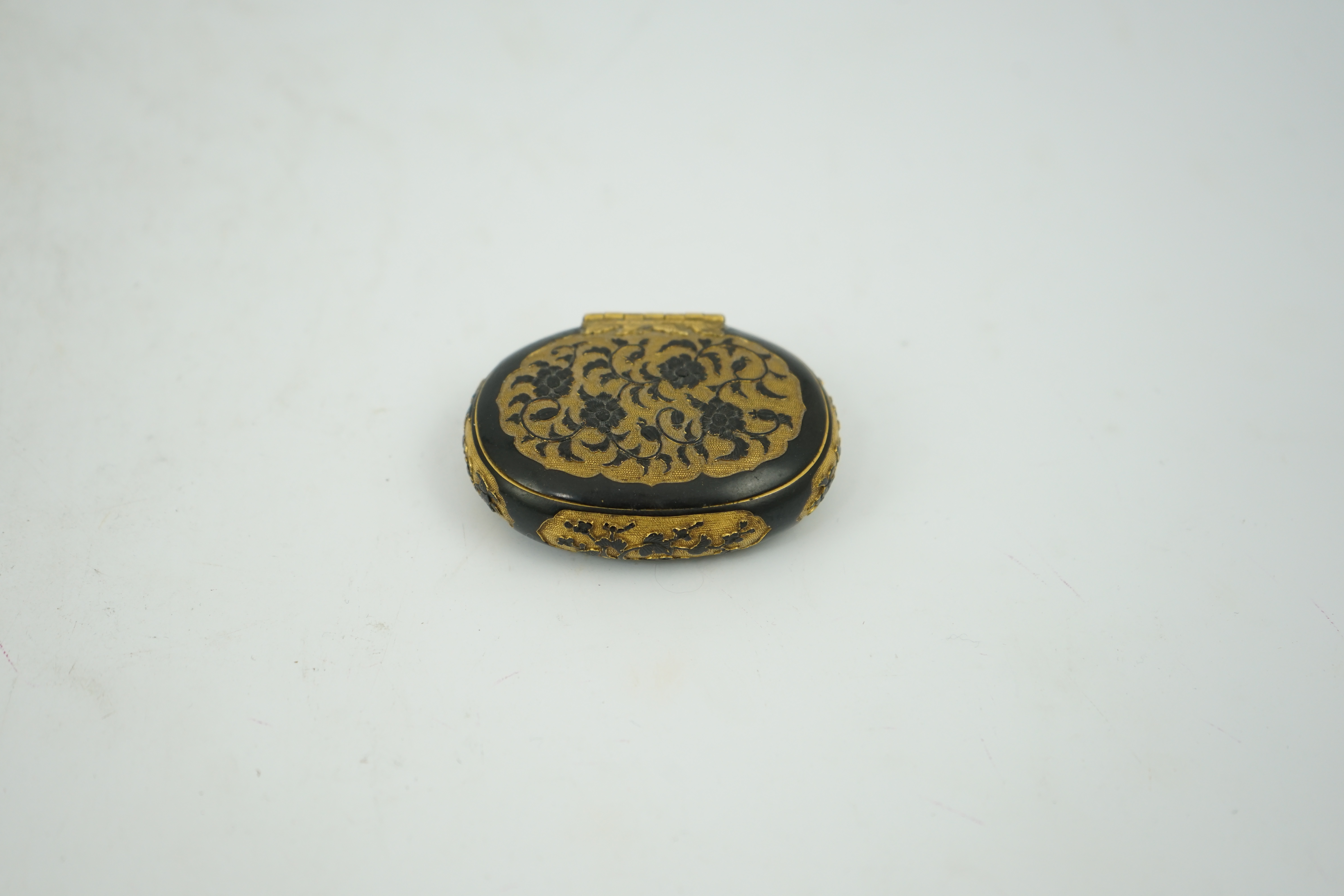 A small Japanese export gilt bronze Sawasa oval tobacco box, 18th century